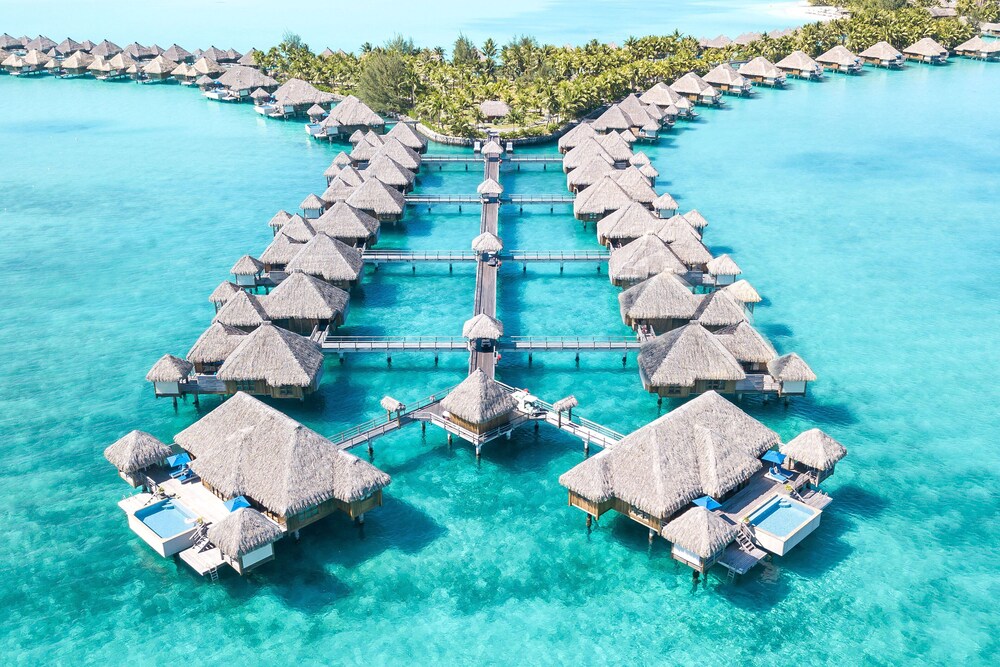 Overwater bungalows in a row at St. Regis Bora Bora 