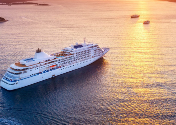 Aerial view of a cruise ship at sunset