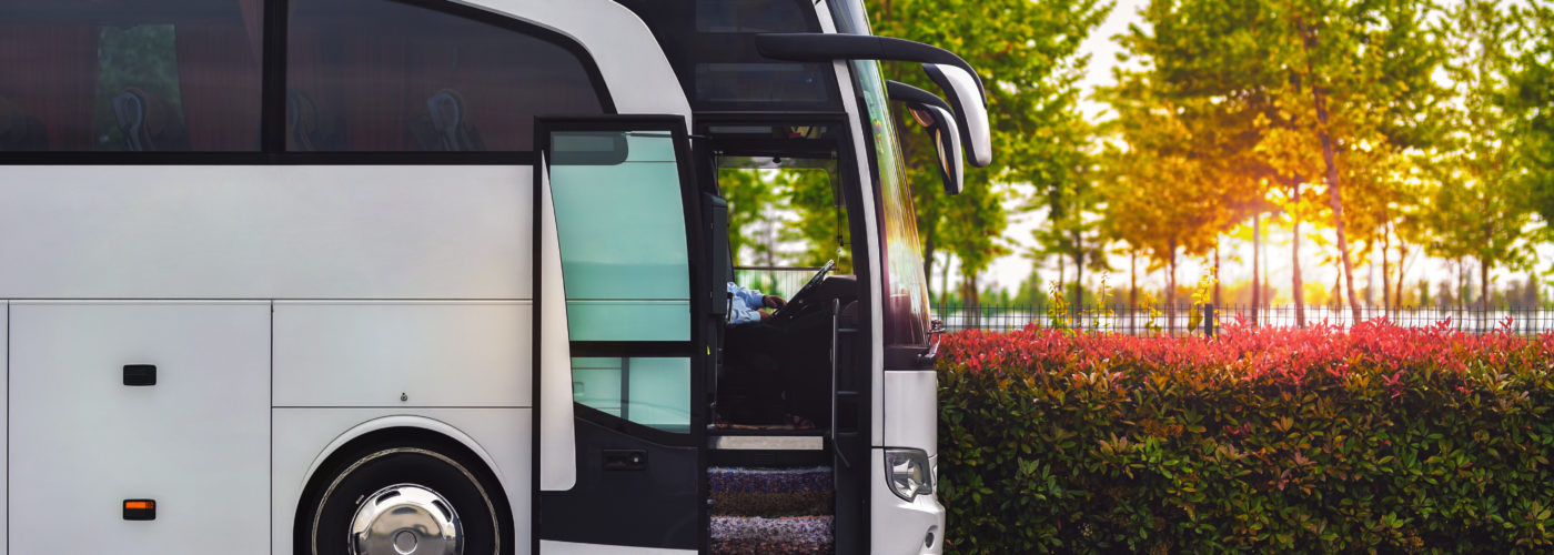 Luxury bus waiting for passengers in parking lot