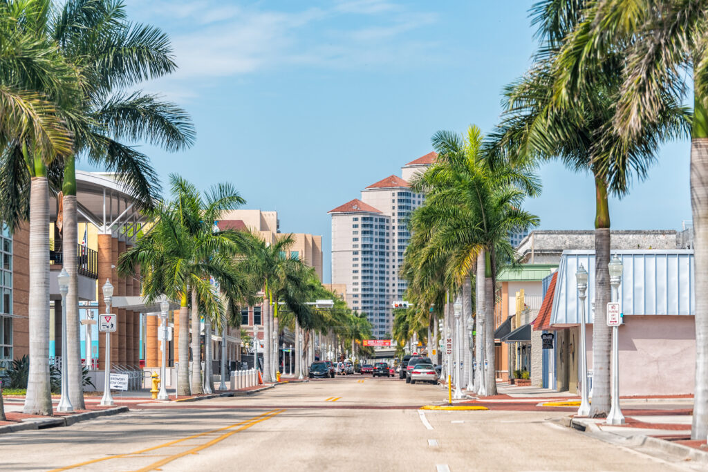 Sunny street lined with Palm Trees in Fort Myers, Florida, United States