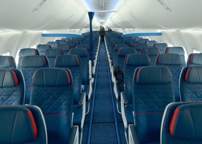 Empty rows of airplane seats