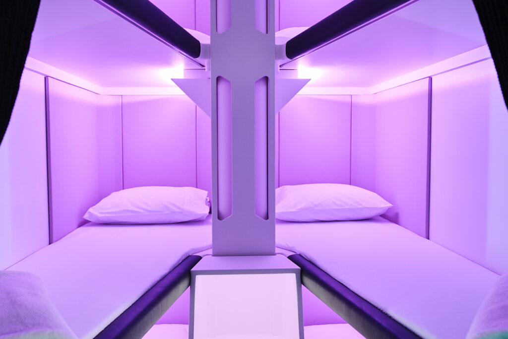 Renderings of the Air New Zealand Skynests, lay-flat economy airline seats resemble bunk beds